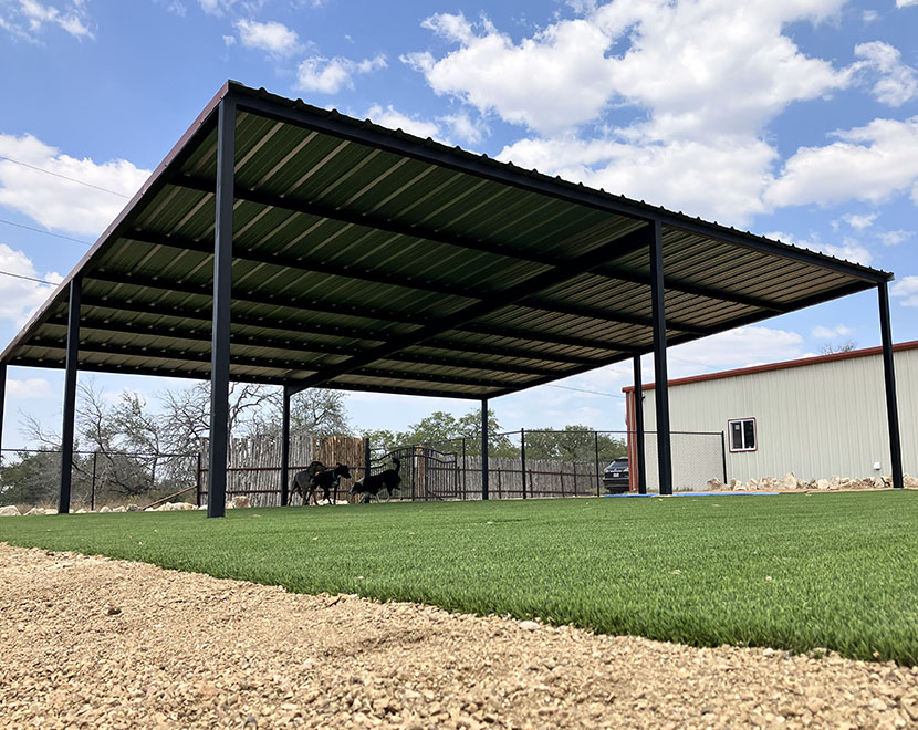 outside play area woof pack lodge dog kennel Marble Falls